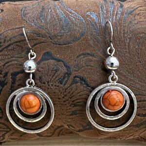 Orbital Silver and Orange Earrings with Concentric Design